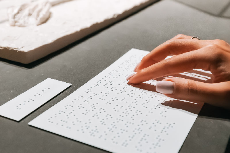 Printing braille and tactile signage