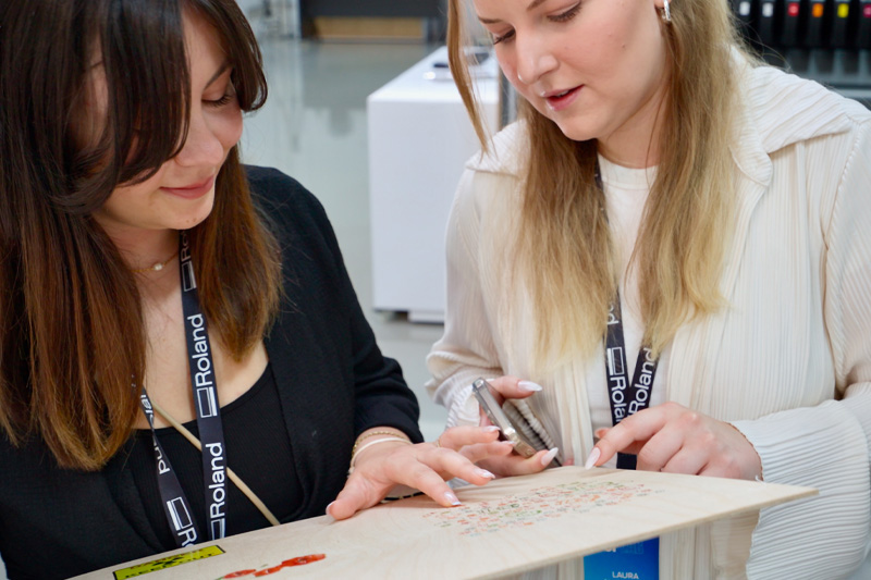 People examining print